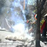enfrentamiento entre policías y evistas