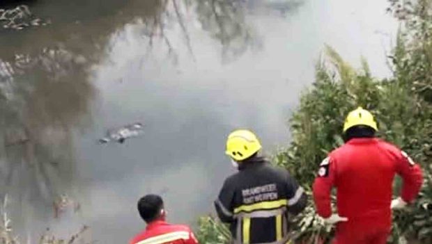 el cadáver flotando en el río Rocha