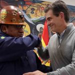 el presidente Paz y el principal dirigente de las cooperativas mineras