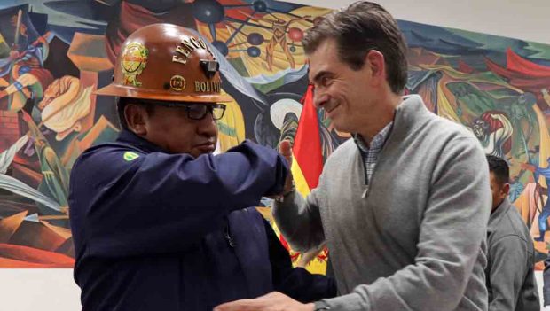 el presidente Paz y el principal dirigente de las cooperativas mineras