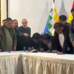 firma del acuerdo entre Gobierno y transportistas