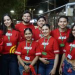 funcionarios de Yango en la Fexco