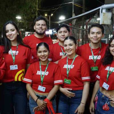 funcionarios de Yango en la Fexco