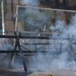 enfrentamiento entre manifestantes y policías cerca de Plaza Murillo