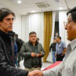 el ministro Zamora y el ejecutivo de los choferes